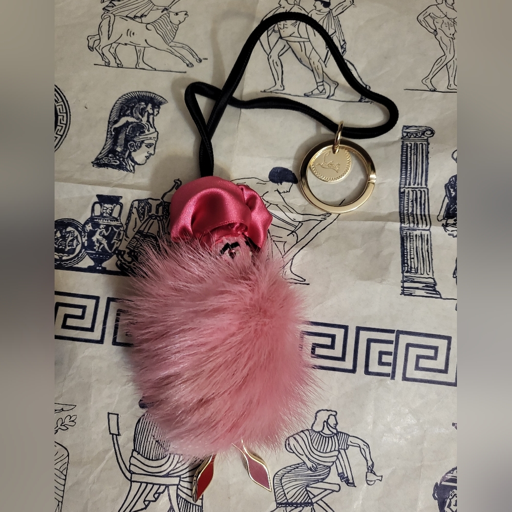 Authentic Christian Louboutin bag charm